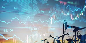 Rise in gasoline prices concept with double exposure of digital screen with financial chart graphs and oil pumps on a field